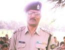 NIA officer shot 24 times as children watched on