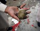 Asked how it works, cop pulls pin off grenade in Pak court