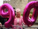 Portraits, gun salutes as Britain's Queen Elizabeth turns 90