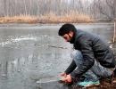 PIX: Freezing cold leaves Kashmir shivering