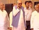 Farooq Abdullah draws flak for using phone during national anthem