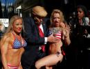 PHOTOS: 'Trump' takes Times Square with a band of bikini-clad babes