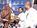 Dadlani gives a coconut to Jain monk Tarun Sagar, then apologises