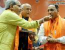 Will Vijay Rupani keep his job after a close fight?