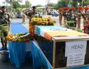 Martyred BSF jawan cremated after Adityanath speaks to family