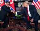 Trump, Kim seal it with a handshake, hold talks