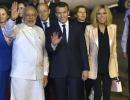 With handshake and hug, PM Modi welcomes Macron at airport