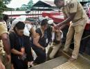 Devotees prevent woman at Sabarimala; police file cases