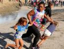 Showdown at Mexican border: US agents fire tear gas at migrants