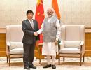 What was Xi Jinping's confidant doing in India?