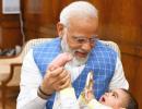 Modi has 'aww' moment with baby in Parliament