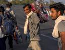 Work can wait, family can't, say stranded migrants