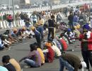 PHOTOS: When highway becomes new home for farmers