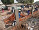 Ahmedabad builds Trump wall to keep slums out of sight