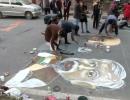 PIX: Jamia students paint road with anti-CAA graffiti