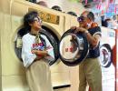 This old couple models people's forgotten laundry!