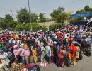 Hoping to go home, migrants walk to rlwy station daily