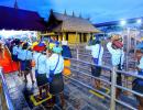 Devotees trek to Sabarimala, pray at temple