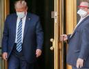 Trump returns to White House, removes mask for photos