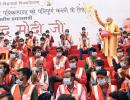 Modi showers floral petals on Kashi corridor workers