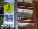 Amnesty India's assets attached in PMLA case