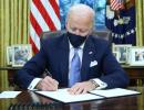 Biden signs executive actions on COVID, climate change