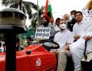 Rahul drives tractor to Parliament over farm laws