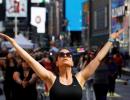 Over 3,000 people perform Yoga at iconic Times Square