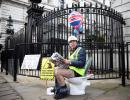 Why is he on a potty outside Boris' home?