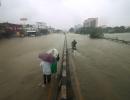 Storm crosses TN coast, 14 killed in heavy rains