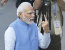 PIX: Modi, Shah among famous faces at polling booth