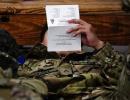 Ukraine: Russia claims troop pullback as world watches