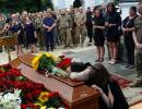 A Mother And Wife Weep For A Life Lost