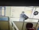 CCTV footage shows terrorist shoot at bank employee