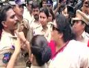 Renuka Chowdhury holds cop by collar during protest