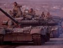 Russian tanks barge in, Ukrainians ready