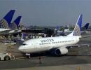 Man opens plane emergency exit, walks on wing in US