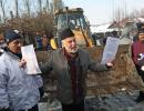 J-K officials raze outer walls of ex-minister's house