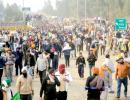 Farmers gathering to resume Delhi march face tear gas