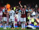 Carroll controversially sent off as West Ham thump Swansea