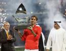 Federer subdues Berdych to win sixth Dubai title