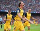 Atletico win La Liga title after draw at Barca