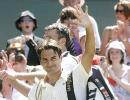 Federer downs Karlovic to reach semis