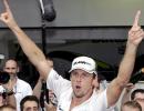 Button spends sleepless night as F1 champion