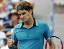 Federer shakes off rust to advance in Toronto