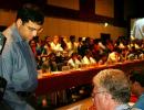 Anand beats 39 chess wizards amid nationality row