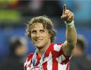 Sneijder, Forlan battle to light up Super Cup