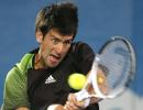 Federer, Djokovic beat crowd favourites