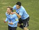 Uruguay beat Ghana on penalties to reach semis