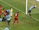 Uruguay's Suarez justifies handling ball